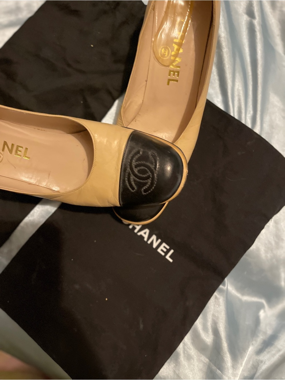 CHANEL Beige Leather Ballet Flats with Black Cap-Toe and CC Logo